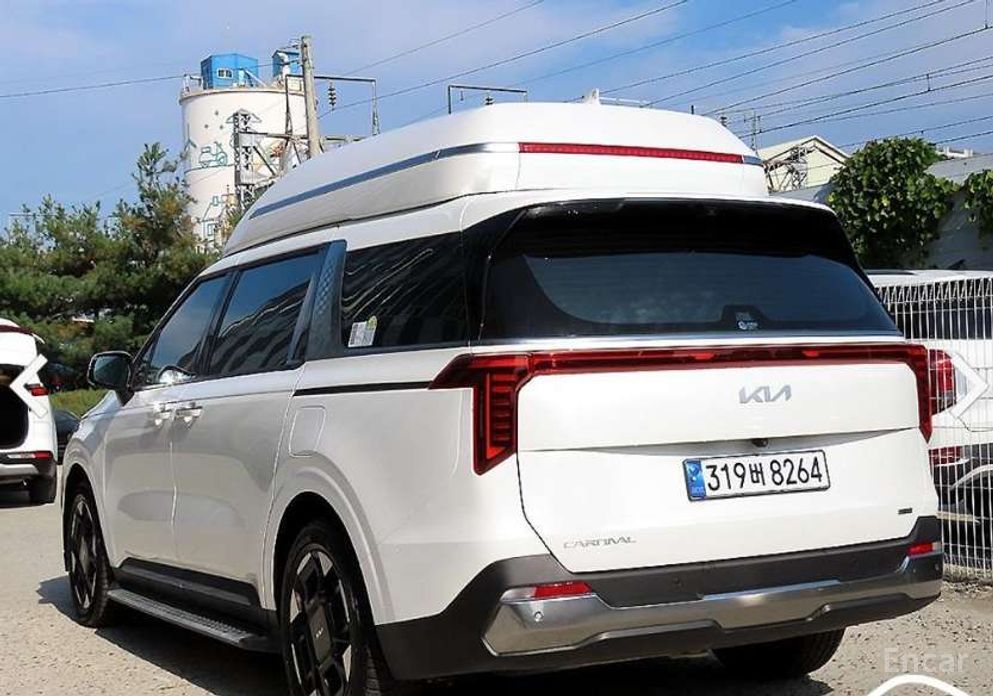 2024 Kia Carnival IV Рестайлинг HEV 9-Seater Hi-Limousine Signature с пробегом 9 908 км