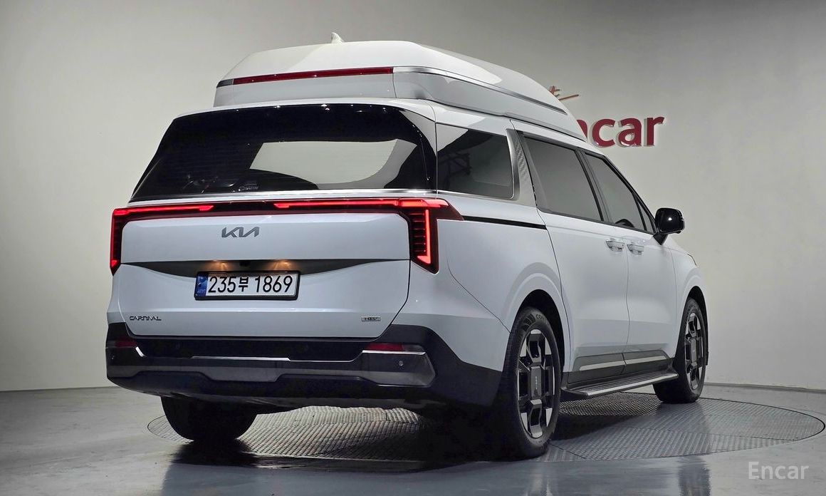 2024 Kia Carnival IV Рестайлинг HEV 9-Seater Hi-Limousine Signature с пробегом 32 696 км