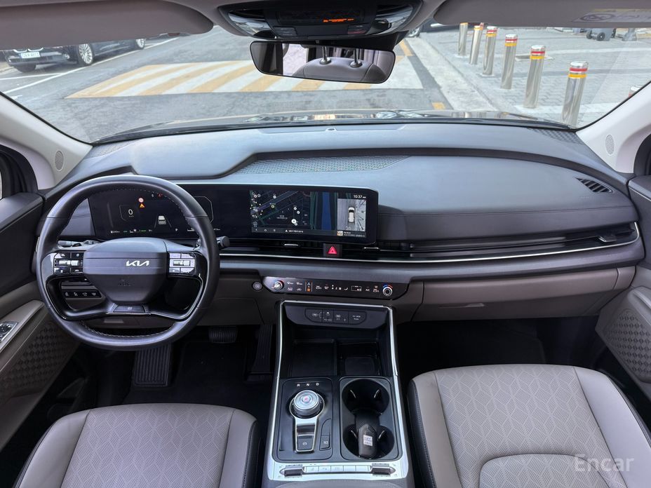 2025 Kia Carnival IV Рестайлинг HEV 9 seater Prestige с пробегом 15 400 км